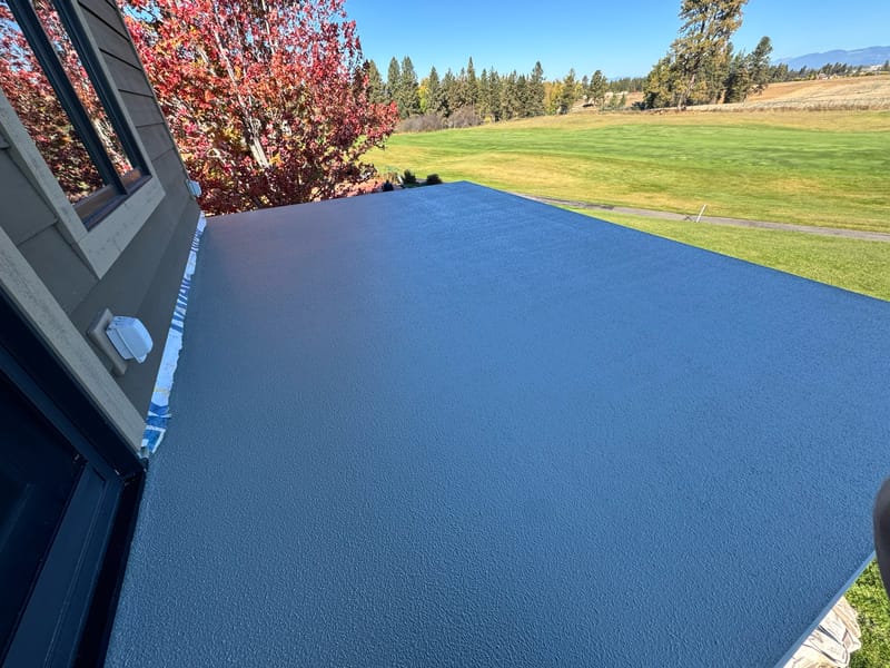 Finished waterproof walk deck on a Kalispell golf-course home.